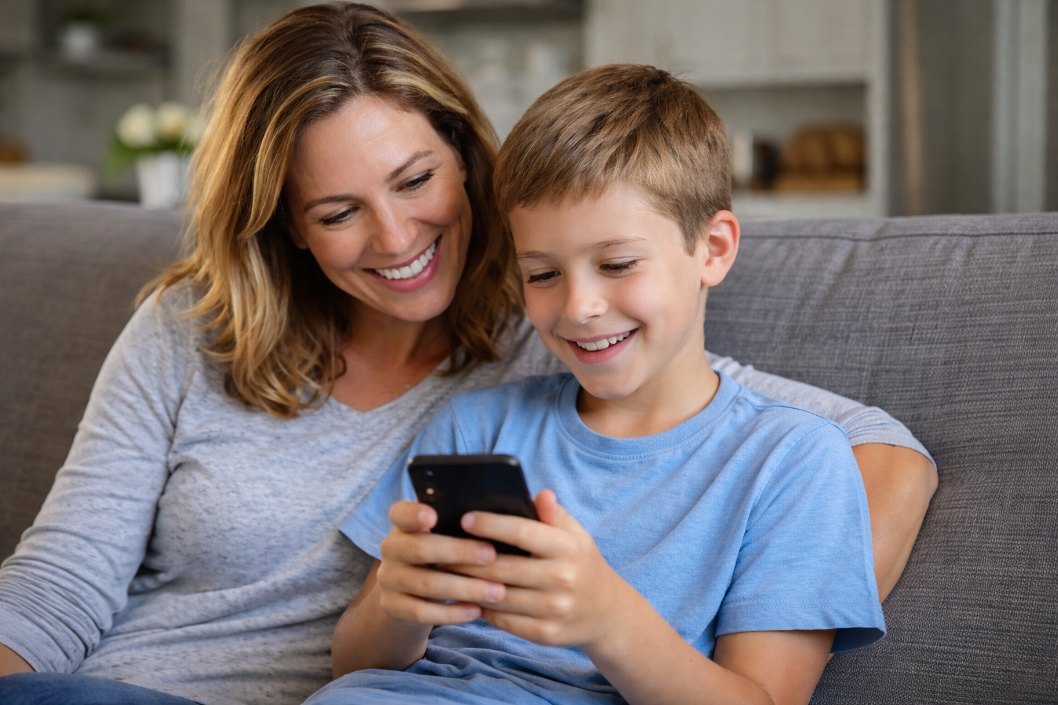 Parent and child using a tablet together at home